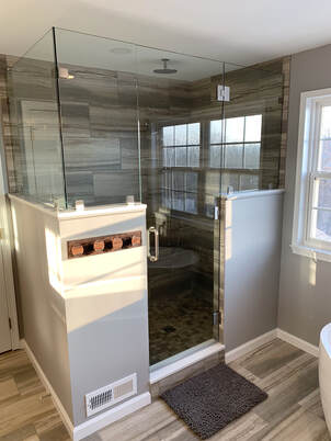 Bathroom shower renovation by D&S Elite Construction, Inc.